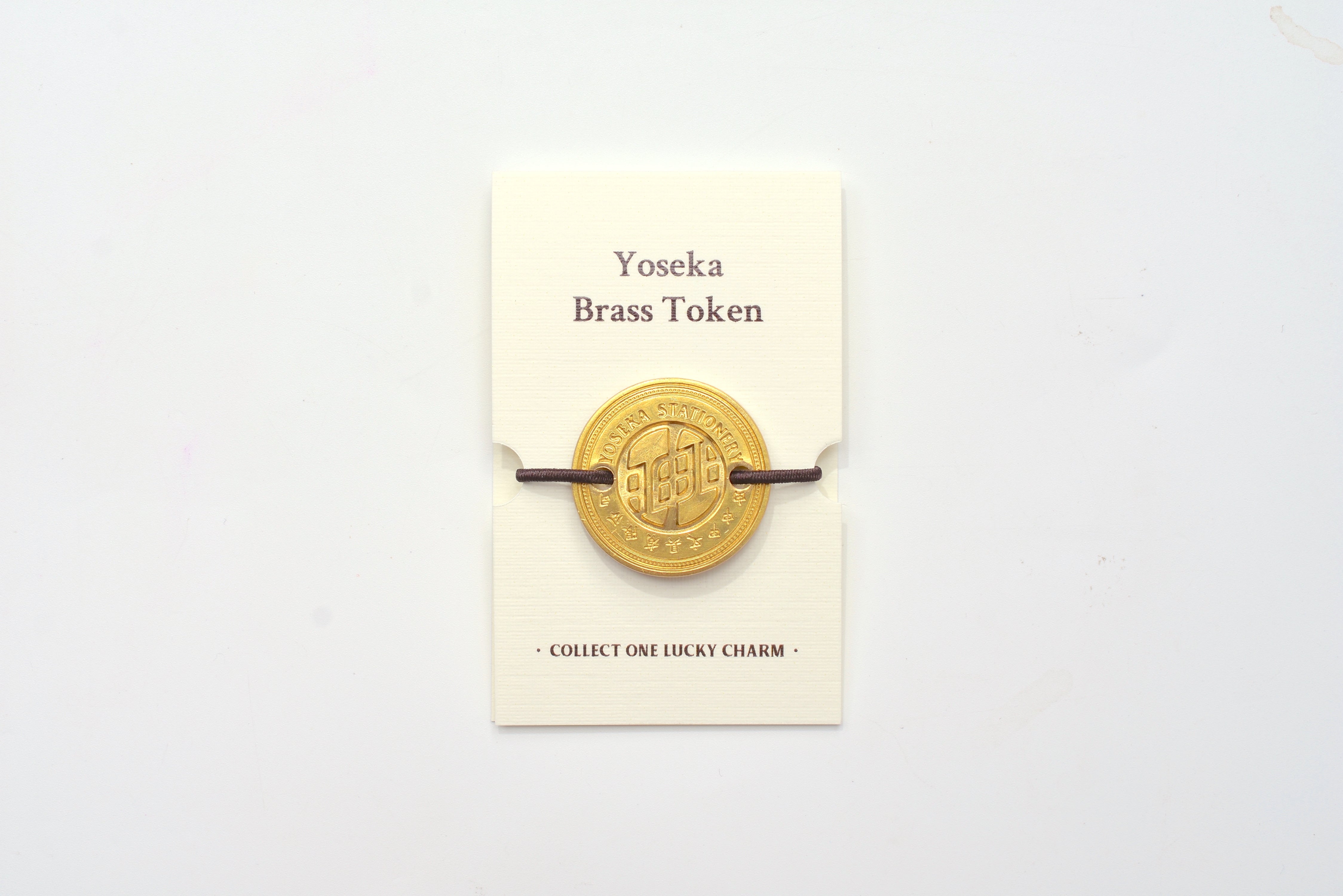 Yoseka Brass Token