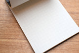 Mnemosyne Stitch Memo Pad - B7 - Grid